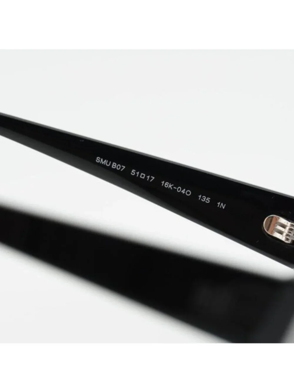 Miu Miu MUB07S 16K04O Sunglasses Black Rectangle Frame, Grey Filter